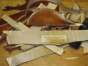 A woman claims that PayPal ordered a Canadian buyer to destroy an antique violin she had sold him. (Regretsy.com)