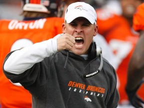 Denver Broncos head coach Josh McDaniels celebrates a first quarter touchdown during an NFL football game in Denver in this November 14, 2010 file photo. (REUTERS/Rick Wilking/Files)