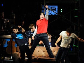 Jake Epstein, Scott J. Campbell, and Van Hughes in Green Day's 'American Idiot' musical on stage at the Toronto Centre for the Arts. (WENN.COM)