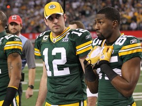 Greg Jennings (right) says he feels Aaron Rodgers (left) is a superior quarterback than was Brett Favre at his peak. (US Presswire)