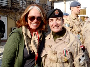 Cpl. Kimberley Warawa and Arlene Dickinson, of CBC's Dragon's Den TV show,in Afghanistan. (SUPPLIED)