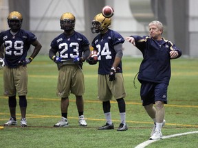 Burke, seen working with the Blue last year, may be on the move. The Ticats are expected to make a decision by week’s end on whether they’ll hire him as head coach. (MARCEL CRETAIN/Winnipeg Sun files)