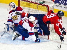 Oil Kings goaltender Laurent Broissoit stops a scoring attempt by Hurricanes” Brody Sutter Wednesday at Rexall Place. (Cody McLachlan, Edmonton Sun)