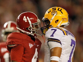 Alabama Crimson Tide’s Mark Barron (left) and LSU Tigers’ Tyrann Mathieu get in each other’s faces when the two teams met earlier this season. LSU won the defensive battle 9-6. (AFP)