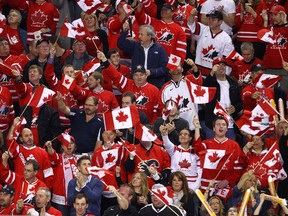 Team Canada fans cheer on as Canada beats Finland for the bronze medal during the World Junior Hockey Championship in Calgary, Alta., Jan. 5, 2012. (DARREN MAKOWICHUK/QMI Agency)