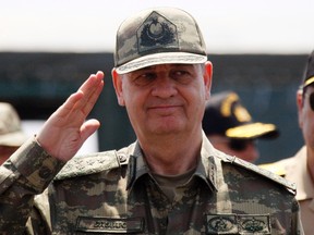 Turkish Chief of Staff General Ilker Basbug salutes during the EFES-2010 military exercise in Izmir in this May 26, 2010 file photo. (REUTERS/Osman Orsal/Files)