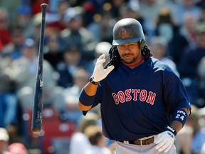 Boston Red Sox's Manny Ramirez tosses his bat after striking out against the Los Angeles Dodgers during their spring training MLB baseball game in Vero Beach, Florida, in this March 9, 2008 file photo.  (REUTERS/Hans Deryk/Files)