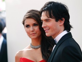 Actress Nina Dobrev and actor Ian Somerhalder arrive at the 63rd Primetime Emmy Awards in Los Angeles September 18, 2011. REUTERS/Danny Moloshok