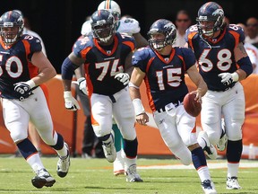 Scarborough’s Orlando Franklin (74) pulls out to help clear the way for Broncos QB Tim Tebow during a game against Miami. Franklin will have a lot of former coaches from T.O. cheering him on this weekend against the Pats. (US Presswire)