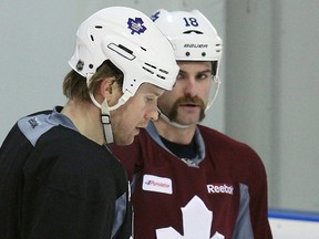 Back at practice on Friday in Etobicoke, Mike Komisarek (left) and Mike Brown, a couple of rugged performers, will be activated for Saturday night's contest with the sublimely tough Red Wings at the ACC. (Craig Robertson, Toronto Sun)