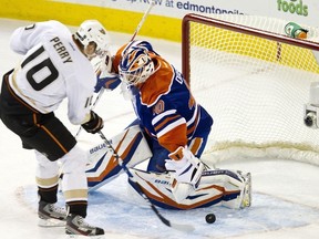 Devan Dubnyk can't stop Corey Perry during the second period Friday night at Rexall Place.
Codie McLachlan, Edmonton Sun