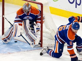 Nikolai Khabibulin lets in a goal during the second period of the Edmonton Oilers 5-0 loss against the Anaheim Ducks at Rexall Place on Friday.
Codie McLachlan, Edmonton Sun