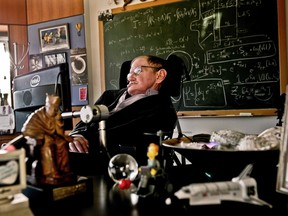 Physicist Stephen Hawking is seen in his office at the University of Cambridge in this photo handed out by the Science Museum and dated December 2011. (REUTERS/Handout)