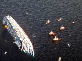 Costa Concordia cruise ship that ran aground is seen off the west coast of Italy at Giglio island January 14, 2012. (REUTERS/ Italian Guardia di Finanza)