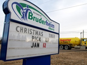 A fuel truck passes one of Bruderheim's town signs on Jan. 11, 2012. The Alberta town is east of a pumping station to be built by Enbridge pending approval of the Northern Gateway pipeline. The Enbridge project is undergoing a review process that includes participation of hundreds of intervenor groups in Kitimat, B.C. IAN KUCERAK/EDMONTON SUN/QMI AGENCY