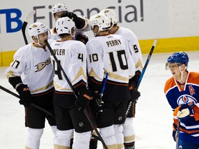 Ales Hemsky skates past as the Ducks celebrate Bobby Ryan's goal during the second period of the Oilers 5-0 loss at Rexall Place Friday.
Codie McLachlan, Edmonton Sun