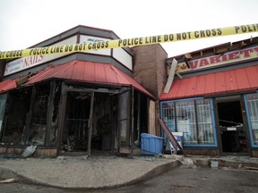 A massage parlour and strip club were hit in three separate fires Sunday morning in London, Ont. (QMI AGENCY)