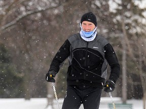 Jeff McMillan took advantage of the mild weather to cross-country ski in Assiniboine Park Saturday. (BRIAN DONOGH/Winnipeg Sun)