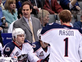 Scott Arniel behind the Columbus Blue Jackets bench Dec. 30, 2010. (QMI Agency files)