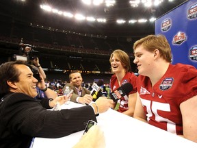 University of Alabama offencive lineman Barrett Jones (R) and tight end Harrison Jones (2nd L) speak to reporters during Media Day before they take on Louisiana State University in the NCAA BCS National Championship, scheduled for January 9, in New Orleans, Louisiana January 6, 2012. (REUTERS/Sean Gardner)