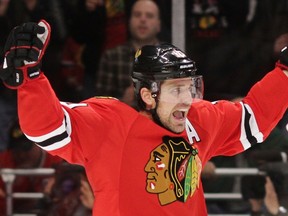 Chicago Blackhawks' Patrick Sharp celebrates a goal against the Calgary Flames during the second period of their NHL hockey game in Chicago December 18, 2011.  (REUTERS/John Gress)