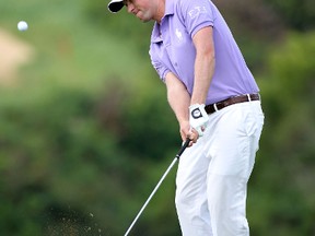 Webb Simpson plays a shot on the ninth hole during the final round of the Hyundai Tournament of Champions at the Plantation Course in Kapalua on Monday. (Getty Images)