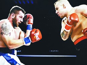 Clayton Gladu, right, follows through on his KO punch against Mariusz Zestawny last month. (Guhdar Photography)