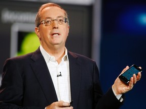 Paul Otellini, president and CEO of Intel Corporation, holds an Intel smartphone reference design as he gives a keynote address during the 2012 International Consumer Electronics Show (CES) in Las Vegas, Nevada, Jan. 10, 2012. REUTERS/Steve Marcus