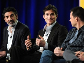 Co-creator and executive producer Chuck Lorre (L) and cast members Ashton Kutcher (C) and Jon Cryer (R) participate in a panel for CBS series "Two and a Half Men" during the CBS sessions at the Television Critics Association winter press tour in Pasadena, California January 11, 2012. REUTERS/Phil McCarten