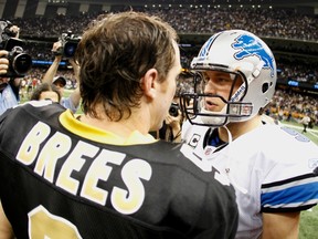 New Orleans Saints quarterback Drew Brees (L) talks with Detroit Lions quarterback Matthew Stafford following their NFL NFC wildcard playoff football game in New Orleans, Louisiana, January 7, 2012. (REUTERS/Sean Gardner)