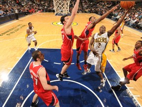 Pacers guard Darren Collison goes to the basket against the Hawks at Bankers Life Fieldhouse in Indianapolis, Ind., Jan. 11, 2012.  (RON HOSKINS/NBAE via Getty Images/AFP)