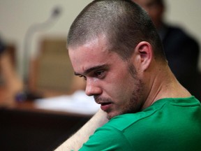 Dutch citizen Joran Van der Sloot sweats while sitting in the courtroom during the reading of his verdict, in the Lurigancho prison in Lima January 13, 2012.  (REUTERS/Pilar Olivares)