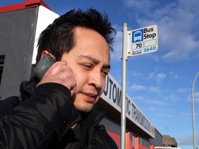 Kevin Valeriano on a cell phone at a bus stop on 99 st in Edmonton, Alberta on January 13, 2012.    PERRY MAH/EDMONTON SUN (Photo illustration)