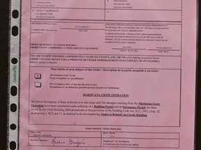 Citry of Ottawa posted an "Order Prohibiting Occupancy of Unsafe Building" on the door of 102 Hobart Crescent where Ottawa Police closed down a marijuana grow op. Friday January 13,2012. (ERROL MCGIHON/THE OTTAWA SUN/QMI AGENCY).