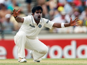 Vinay Kumar of India unsuccessfully appeals for the wicket of Michael Hussey of Australia during the second day of their third cricket test at the WACA in Perth, January 14, 2012.  (Brandon Malone/Reuters)