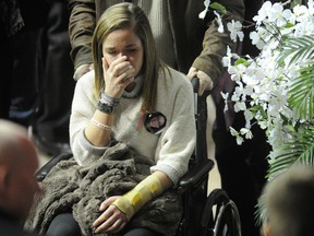 Shayna Conway is wheeled out of the Enmax Centre in Lethbridge, Alberta on January 14, 2012. (STUART DRYDEN/QMI AGENCY)