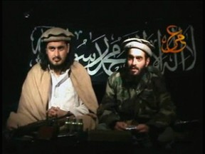 Taliban leader Hakimullah Mehsud (L) sits beside a man who is believed to be Humam Khalil Abu-Mulal Al-Balawi, the suicide bomber who killed CIA agents in Afghanistan. (REUTERS/Tehrik-i Taliban Pakistan via Reuters TV/Files)
