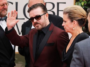Host Ricky Gervais and partner Jane Fallon arrive at the 69th annual Golden Globe Awards in Beverly Hills, California January 15, 2012.  REUTERS/Mario Anzuoni