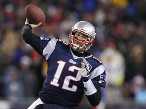 Patriots' Tom Brady throws a pass against the Denver Broncos on Saturday. (AFP)