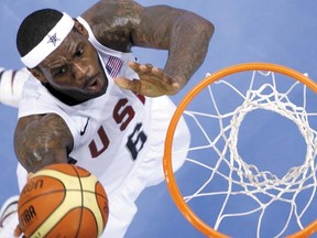 Team USA's LeBron James goes up to score against Australia during the 2008 Beijing Olympics. (REUTERS/Lucy Nicholson/Files)