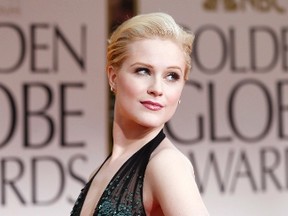 Actress Evan Rachel Wood poses as she arrives at the 69th annual Golden Globe Awards in Beverly Hills, California January 15, 2012. (REUTERS/Mario Anzuoni)
