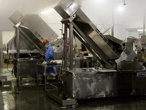 A major anti-bacterial cleaning operation takes place at the Maple Leaf Food plant in Toronto where meat tainted with listeriosis originated four years ago. (Dave Thomas, QMI Agency)