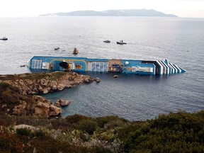 A view shows the Costa Concordia cruise ship that ran aground off the west coast of Italy, at Giglio island January 15, 2012. (REUTERS/ Max Rossi)