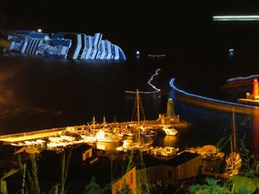 The Costa Concordia cruise ship is seen off the west coast of Italy, at Giglio Island January 16, 2012. REUTERS/ Max Rossi