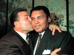 George Chuvalo, seen here with Muhammad Ali at a 1994 dinner in Chuvalo's honour, said Ali, who celebrates his 70th birthday Tuesday, is a man "with a very big heart.” (QMI Agency file)