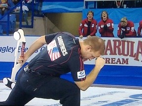 Jeff Stoughton team member Reid Carruthers does a Tim Tebow during the Continental Cup. (TSN)