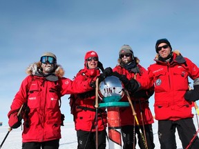 Norwegian Prime Minister Jens Stoltenberg (2nd L) poses at the mark of the South Pole together with modern-day polar adventurers and compatriots Jan Gunnar Winther (L), Stein Aasheim (2nd R) and Borge Ousland (R). (REUTERS/ Ole Mathismoen/SMK/Handout)