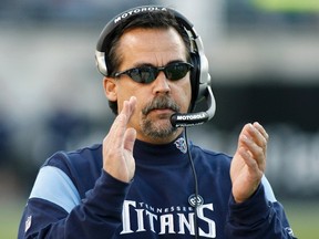 Tennessee Titans head coach Jeff Fisher claps on the sidelines during an NFL football game in Jacksonville, Florida in this November 16, 2008 file photo. (REUTERS/Mark Wallheiser/Files)