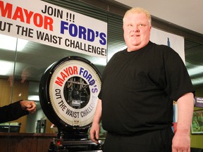Toronto Mayor Rob Ford stands on the scales Monday. Columnist Strobel says he should think twice before shedding 50 pounds. (MICHAEL PEAKE/Toronto Sun)
