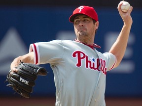 Philadelphia Phillies starting pitcher Cole Hamels throws a pitch to the New York Mets in the first inning of their MLB National League baseball game at CitiField in New York, July 16, 2011. (REUTERS/Ray Stubblebine)